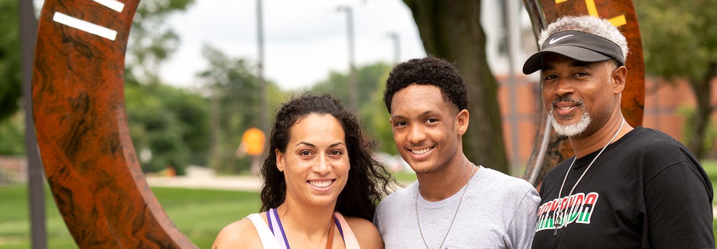 Students on campus with families