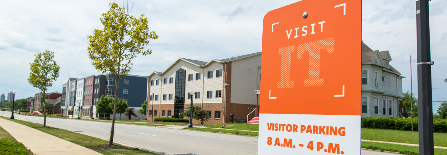 Visitor parking sign