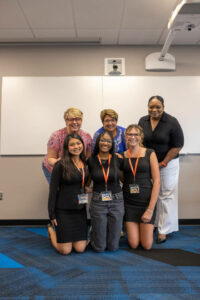 Students posing with professors