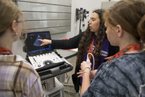 Dr. Anna Nagel demonstrating an ultrasound machine