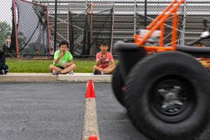 Students timing a dune buggy