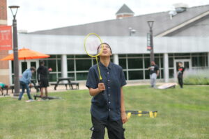 Student playing badminton