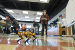 Student piloting a robot