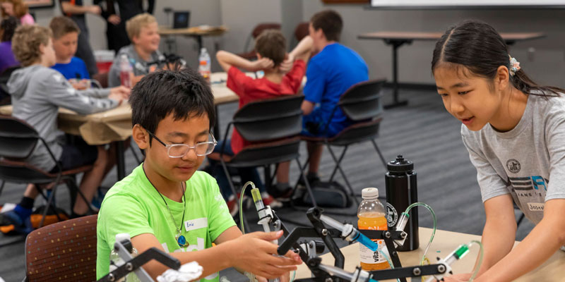 Students working with hydrolics