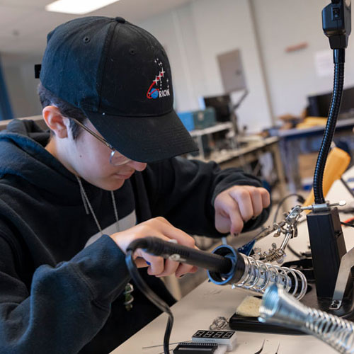 Summer camp student soldering