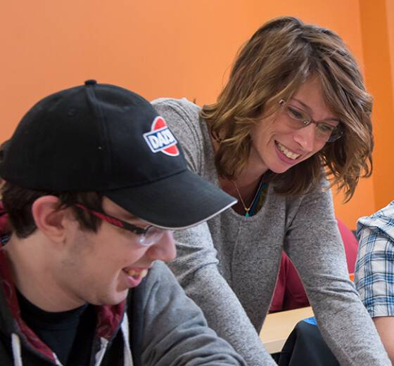 Dr. Susan McGrade with a student