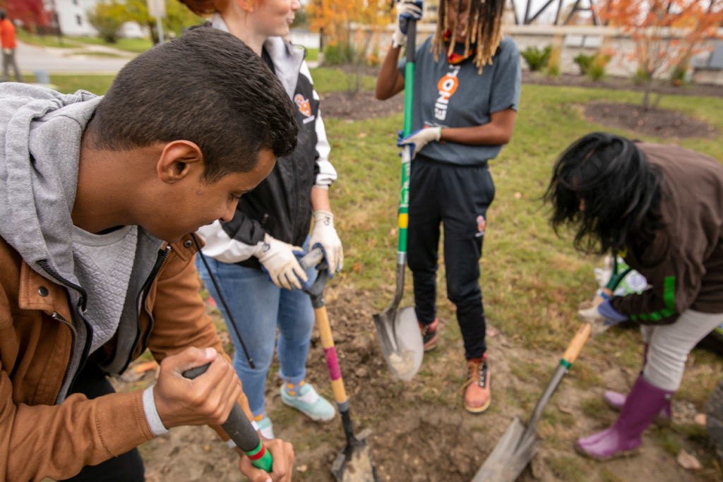 Indiana Tech Students from the Green Team advocating sustainability by planting trees on campus