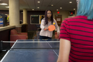 Students playing ping pong