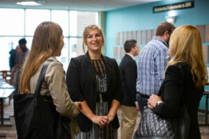 Students talking in Seitz Conference Room