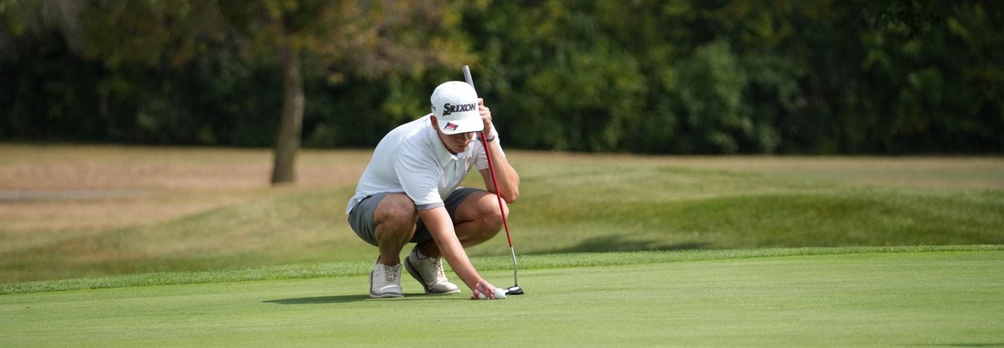 Golfer placing a putt shot