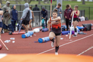 Indiana Tech track athlete preparing to jump in a pole vault