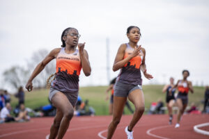 Indiana Tech student athlete competing against visiting teams on the outdoor track