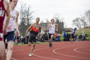 Indiana Tech student athlete competing against visiting teams on the outdoor track