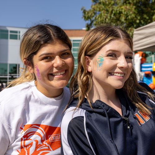 students showing of their face painting
