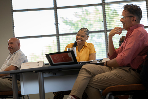 adults interacting in a classroom