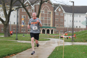 President Karl Einolf participating in the 2022 Run to Crush Hunger