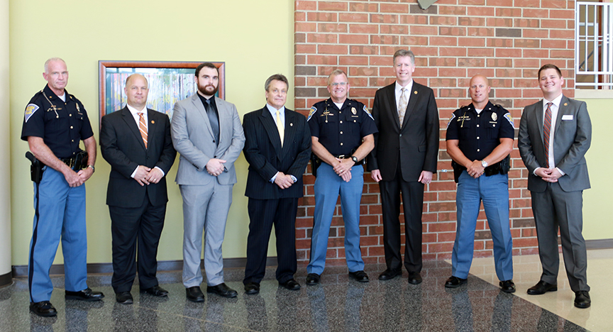 group From left to right: Indiana State Police major Danny Price, Indiana Tech vice president for Academic Affairs, Dr. Thomas Kaplan; associate professor of criminal justice, Tyler Counsil; director of Indiana Tech’s Center for Criminal Justice, Dominic Lombardo; Indiana State Police superintendent Douglas Carter; Indiana Tech president Dr. Karl Einolf; Indiana State Police sergeant Matt Voorhees; Indiana Tech admissions representative Jackson Huff