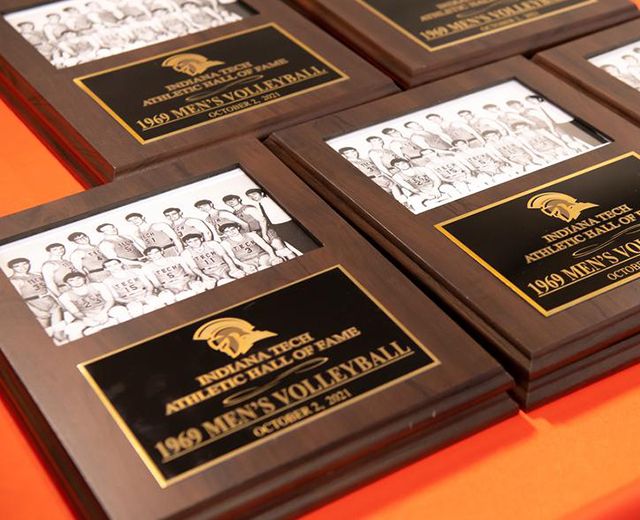 photo of indiana tech athletics hall of fame plaques on a table