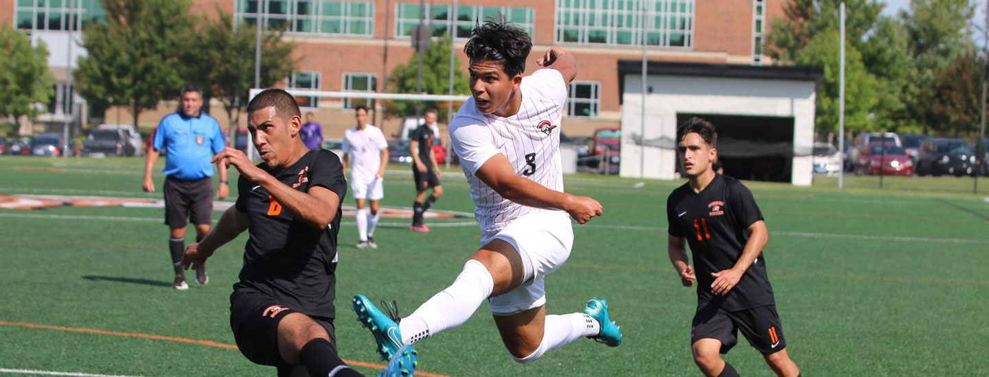 Israel Vaides playing soccer