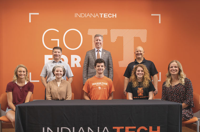 President Einolf, Dr. Dan Stoker and Dr. Thomas Kaplan posing with Indiana Tech leader scholars