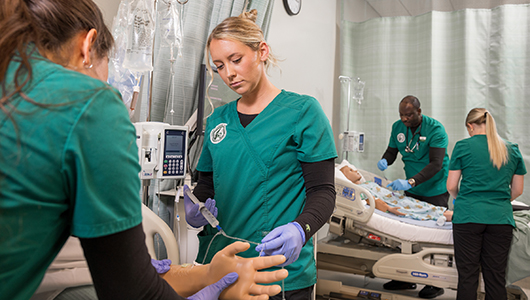 photos of nursing students at work