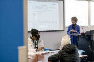 Sherrill Hamman instructing students in class